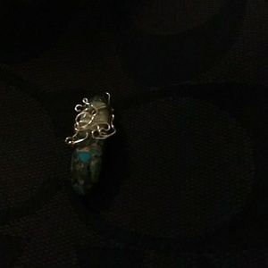 Wire wrapped stone pendant